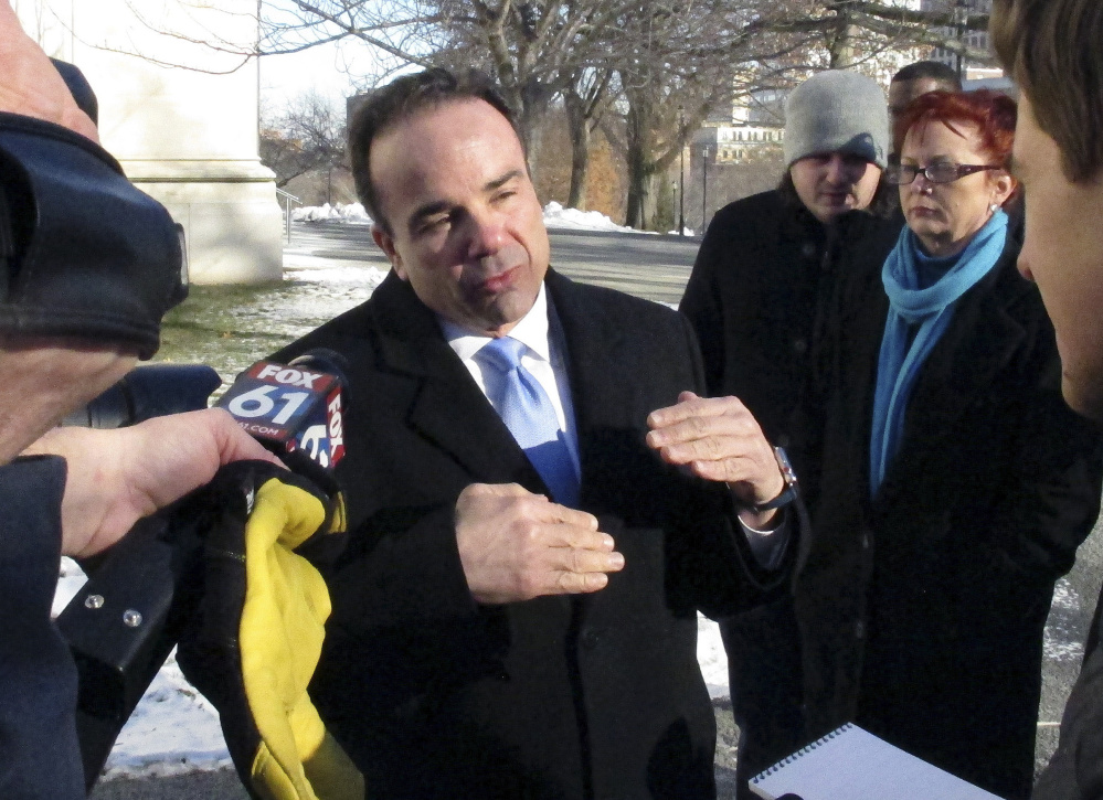 Bridgeport Mayor Joe Ganim with reporters after filing to run for governor in Hartford, Conn., on Wednesday. Later, an SUV in which he was a passenger was pulled over for speeding.