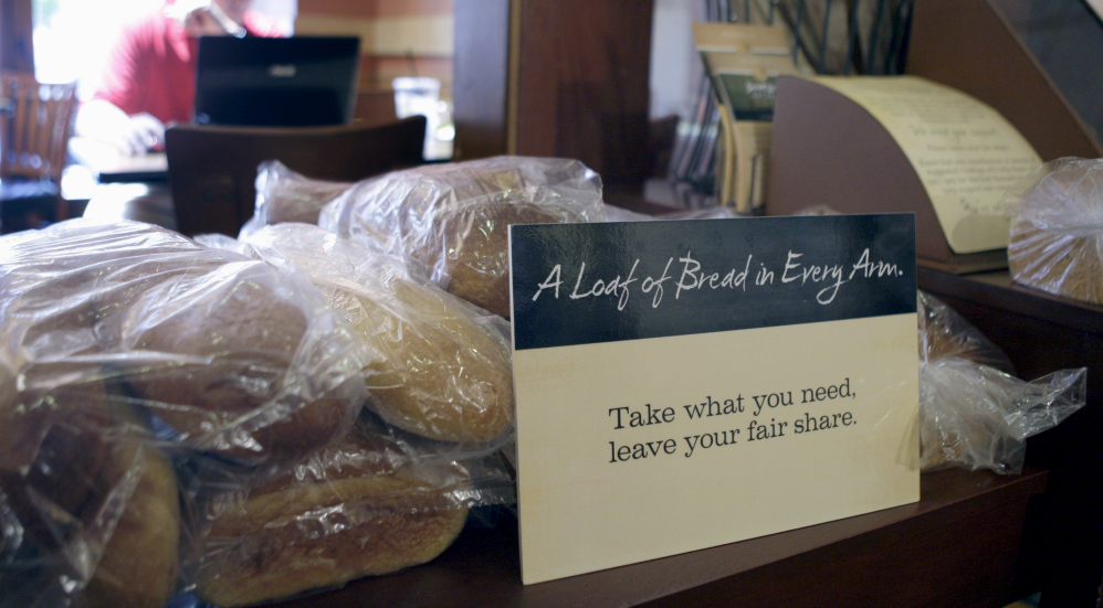 Loaves of bread sit on a table at St. Louis Bread Co. Cares Community Cafe, part of Panera, in Clayton, Mo.
