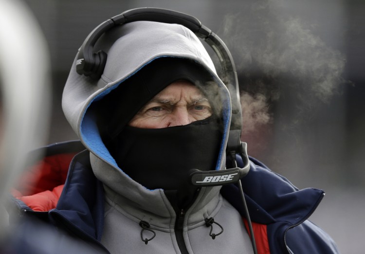 New England Patriots Coach Bill Belichick bundled against the cold weather last Sunday against the Jets at Foxborough, Mass. He left no room for error for his players getting to practice in spite of the storm that blanketed New England. "Every day's a work day," Belichick said.