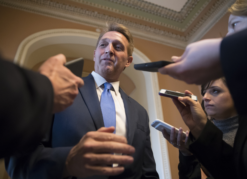 Sen. Jeff Flake, R-Ariz., who announced last year he would not run for re-election in 2018, takes questions from reporters at the Capitol in Washington on Thursday.
Associated Press/J. Scott Applewhite