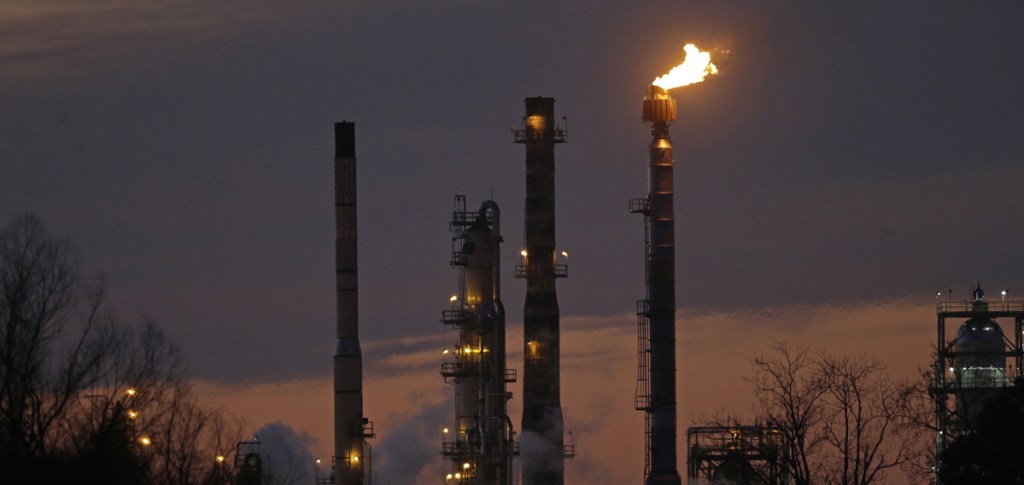 An ExxonMobil refinery in St. Bernard Parish, La. New York City will begin dumping about $5 billion in pension fund investments in fossil fuel companies, including Exxon Mobil.