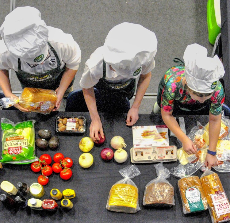 Contestants search the pantry at the start of a cooking contest during the 2018 Agricultural Trades Show in the Augusta Civic Center. Representatives of the U.S. Department of Agriculture won’t be attending the Maine trade show next week because of the partial government shutdown.