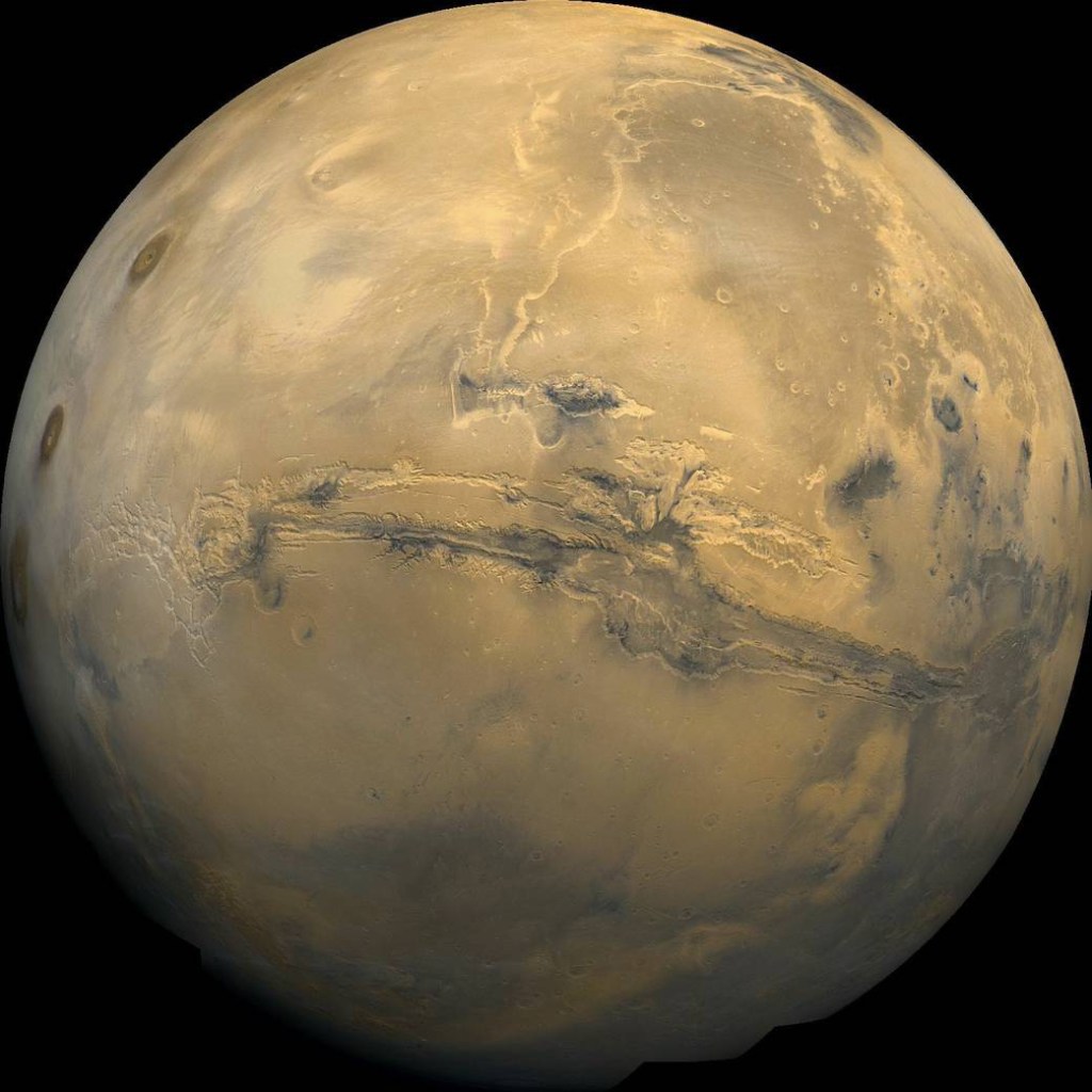 Planetary scientists say a new analysis of data shows that thick ice sheets hide just below parts of the surface of Mars.
NASA photo