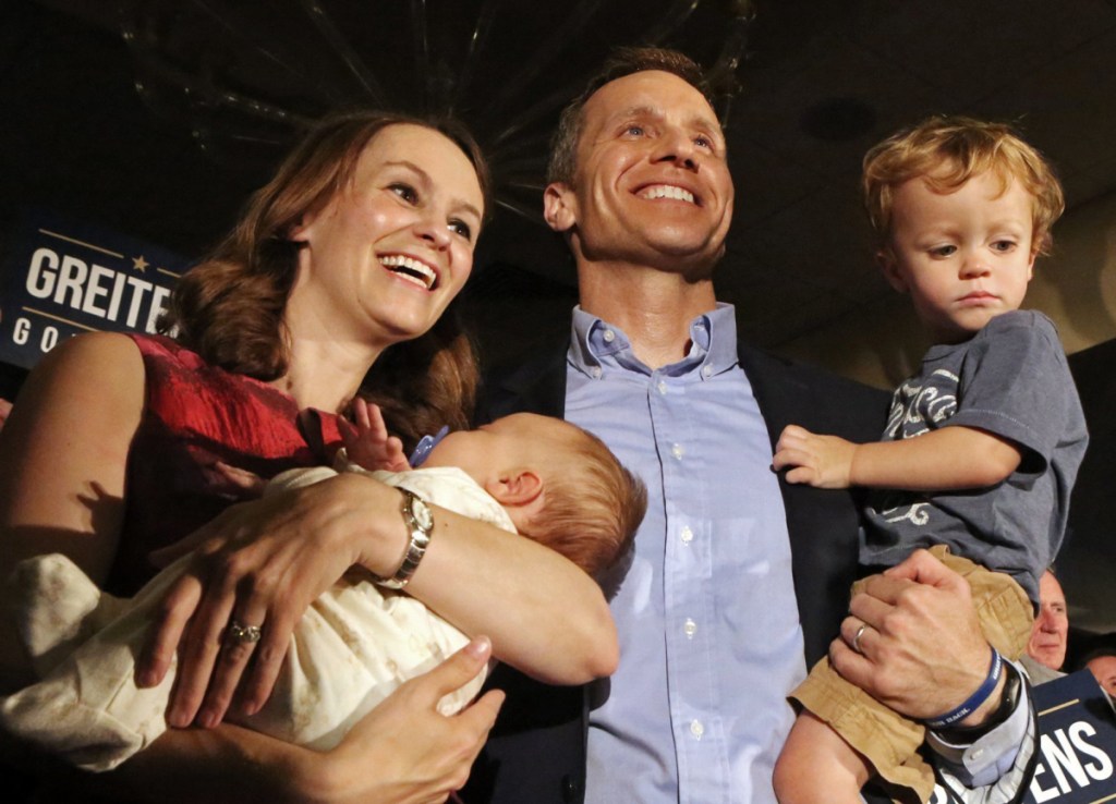 Eric Greitens, a rising star in the Republican Party, celebrates winning the primary election with his wife, Sheena, and his two sons, Jacob and Joshua, in 2016.