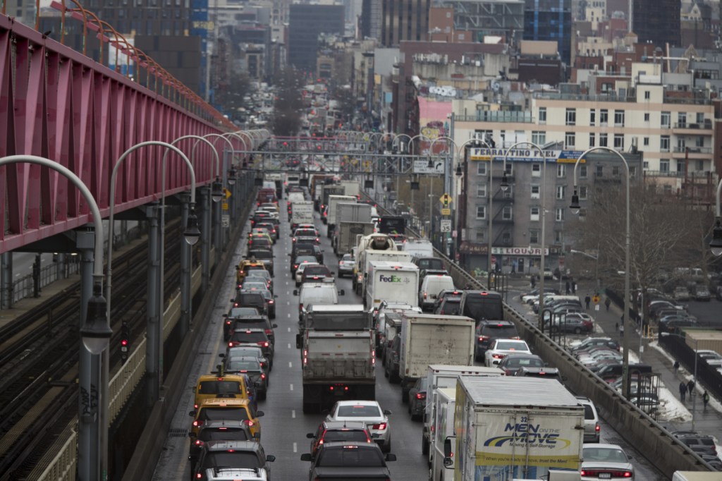 Traffic crosses the Williamsburg Bridge in New York from Brooklyn into Manhattan. A proposal to make part of Manhattan a toll zone is gaining momentum.