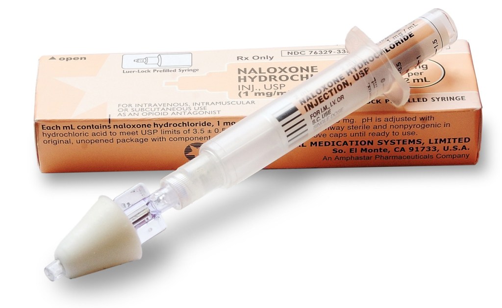 A 2014 photo shows an emergency opioid overdose kit at the MaineGeneral Harm Reduction program office in Augusta. The cone-shaped adapter is placed in the victim's nose to turn the liquid naloxone into a spray that helps a victim of overdose start breathing again.