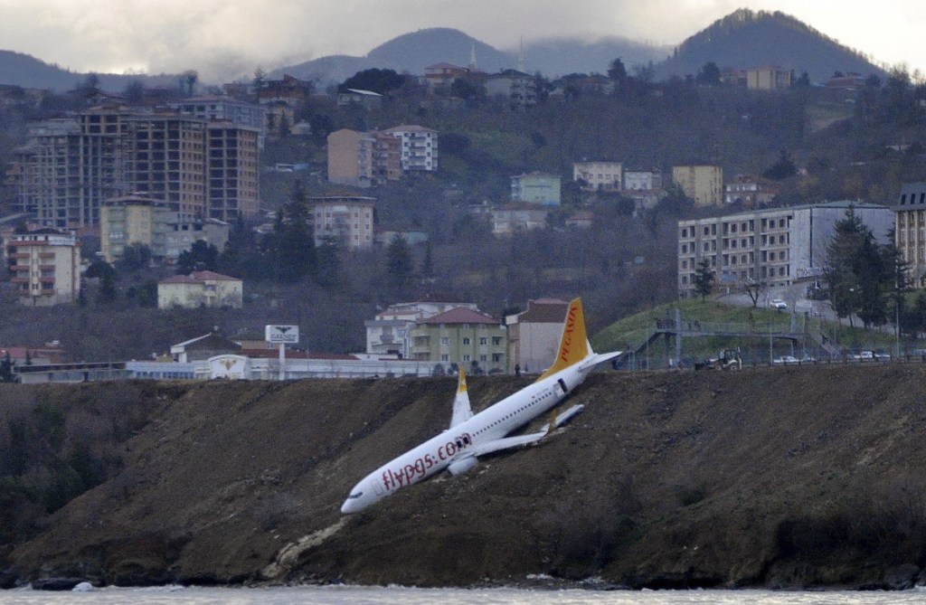 A Boeing 737-800 of Turkey's Pegasus Airlines skidded off the runway downhill toward the sea at the airport in Trabzon, Turkey, on Sunday.