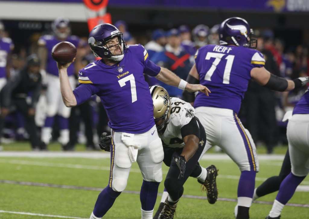 Minnesota quarterback Case Keenum is pressured by New Orleans defensive end Cameron Jordan during the second half of the Vikings' 29-24 win Sunday in Minneapolis. The Vikings scored on the game's final play and advance to face Philadelphia in the NFC title game.