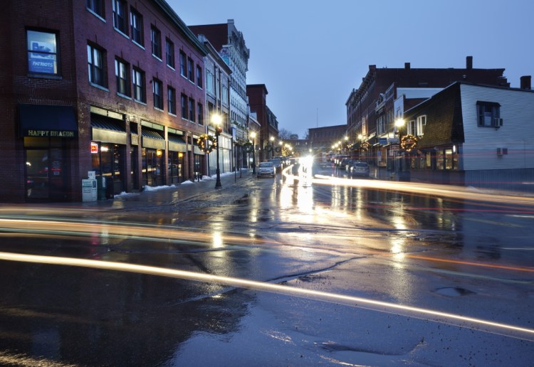 The headlights of cars streak in a long exposure photograph taken this month in Biddeford. The Biddeford City Council last week unanimously approved a six-month moratorium on marijuana businesses while the Legislature works on setting regulations.