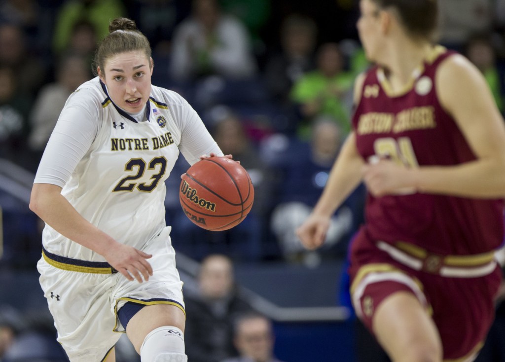 Jessica Shepard of Notre Dame drives down the court Sunday during the 89-60 victory against Boston College. Shepard scored 24 points in 22 minutes for the second-ranked Fighting Irish.