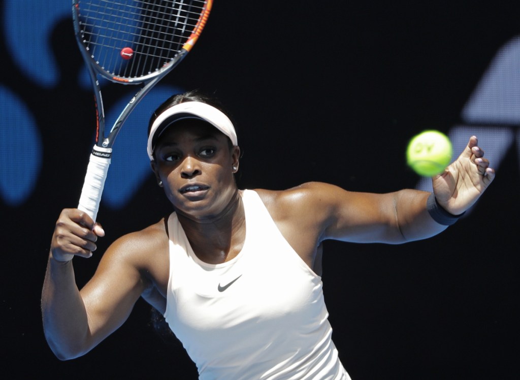 Sloane Stephens of the U.S. makes a return to Zhang Shuai of China during their first-round match Monday at the Australian Open. Zhang won, 2-6, 7-6 (2), 6-2.