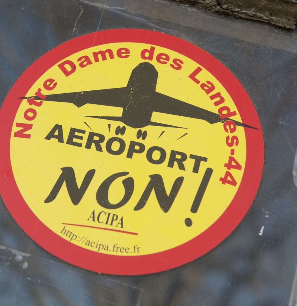 A sticker reading "No to the airport" adorns the window of a farm in western France. Plans for the airport were first made 50 years ago.