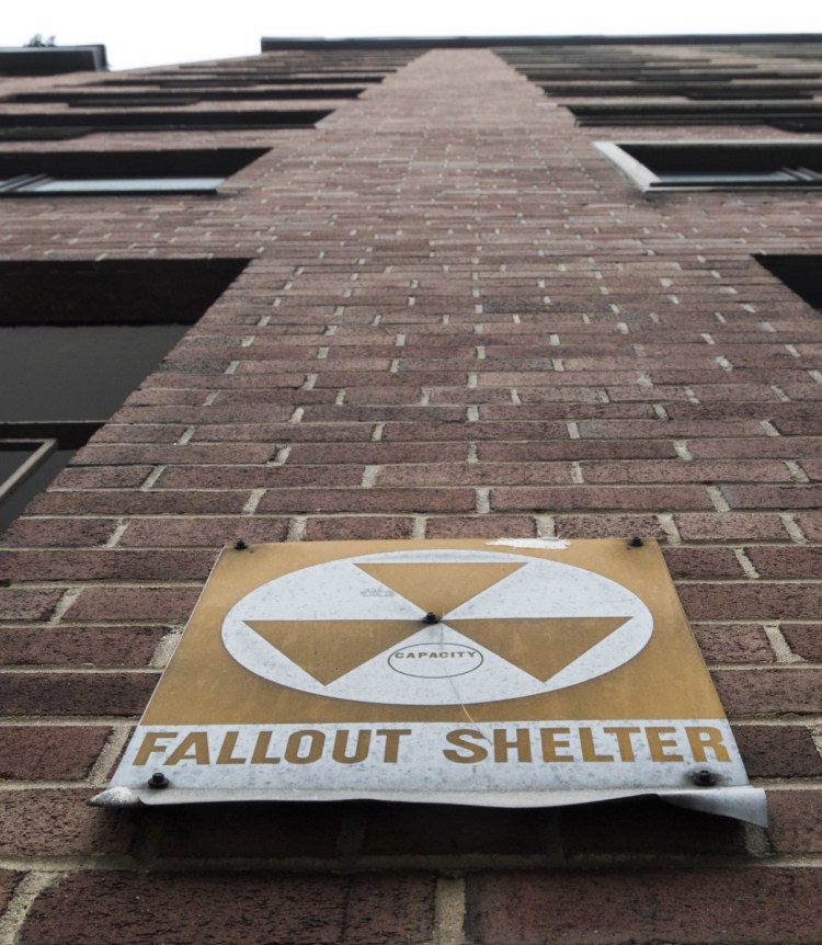 A fallout shelter sign on a building on East 9th Street in New York. Shelters are not seen as useful today in part because large superpower nations are less likely to attack.
