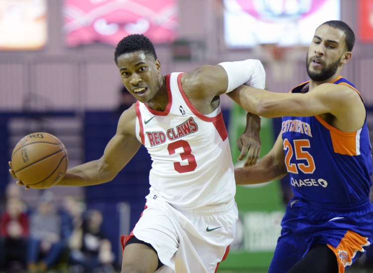 Daniel Dixon of the Maine Red Claws played more than 45 minutes Thursday night, scoring 22 points in a loss to the Westchester Knicks.