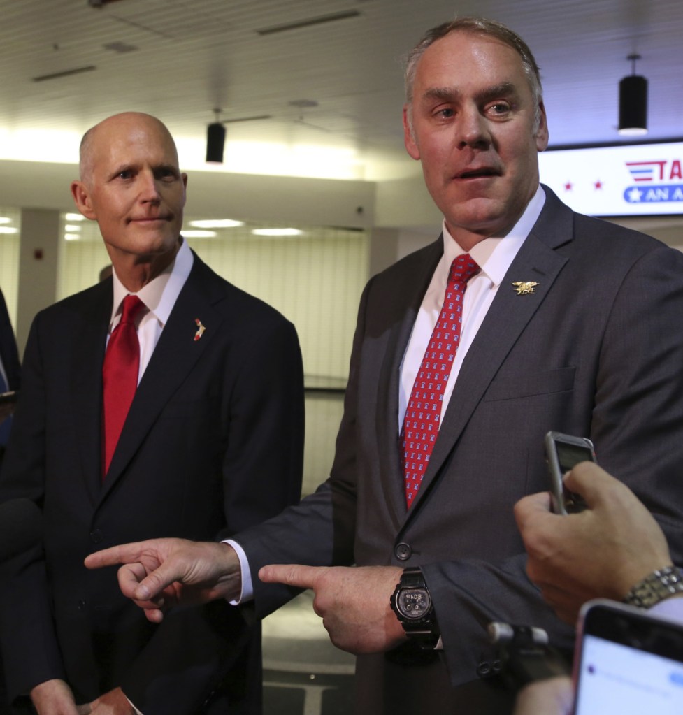 Florida Gov. Rick Scott and Interior Secretary Ryan Zinke hold a news conference in Tallahassee on Jan. 9.