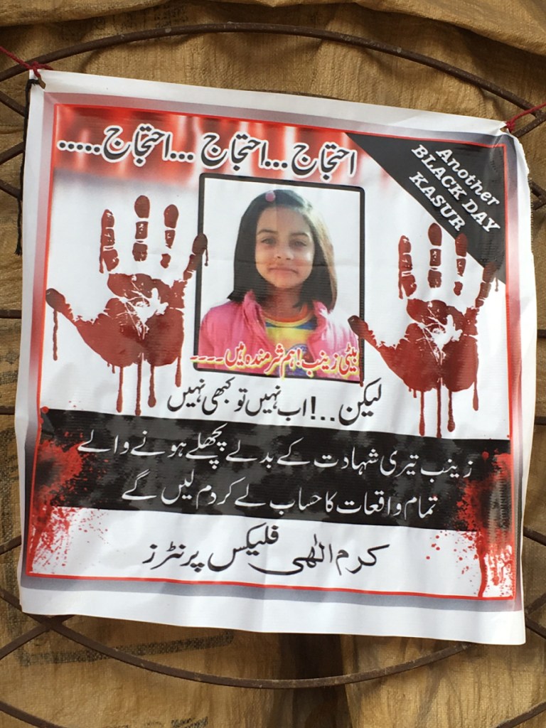 A poster of 7-year-old Zainab Amin, whose rape and murder in Kasur, Pakistan, shocked the nation, have been appearing throughout her community.