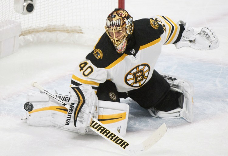 Boston Bruins goaltender Tuukka Rask makes a save against the Montreal Canadiens during the first period of an NHL hockey game, Saturday, Jan. 20, 2018 in Montreal. (Graham Hughes/The Canadian Press via AP)