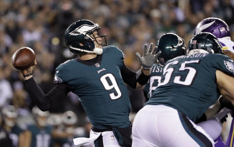 Philadelphia quarterback Nick Foles throws a pass in the first half of the Eagles' 38-7 win over the Vikings in the NFC championship game Sunday in Philadelphia.