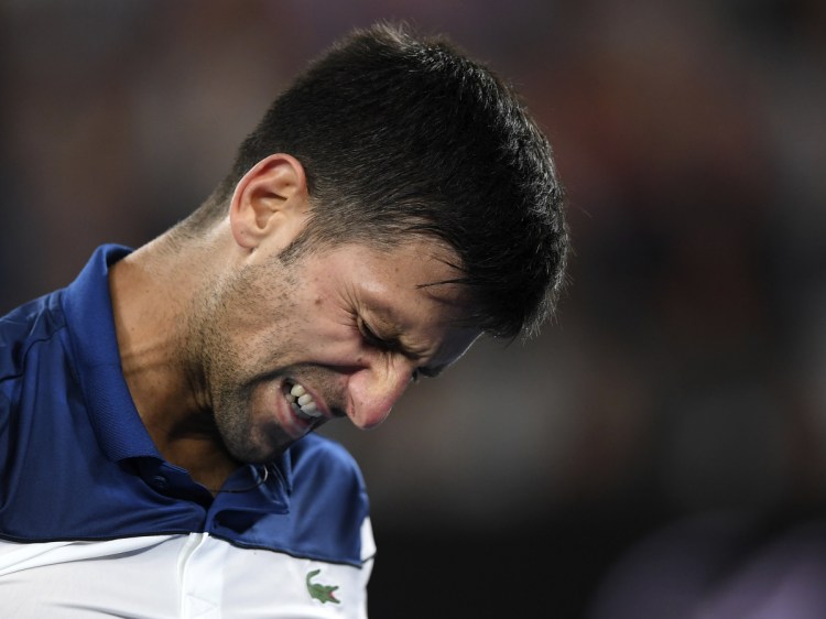 Novak Djokovic grimaces during his fourth round match against Hyeon Chung at the Australian Open in Melbourne on Monday. Djokovic, a six-time champion, lost to Chung in straight sets.