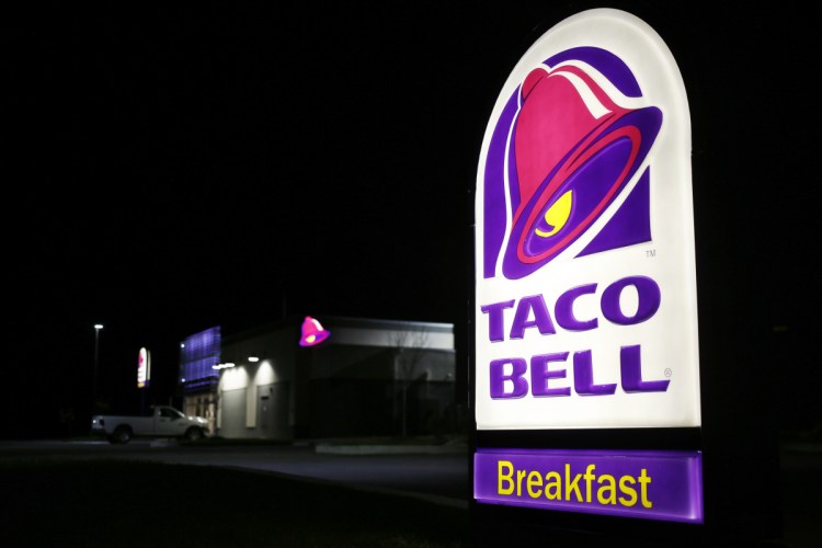 A Taco Bell sign outside a restaurant in Shelbyville, Kentucky. In Alabama, the fiery destruction of a 24-hour Taco Bell led to more than 100 Fire Sauce devotees attending a candelight vigil for the beloved late-night spot.