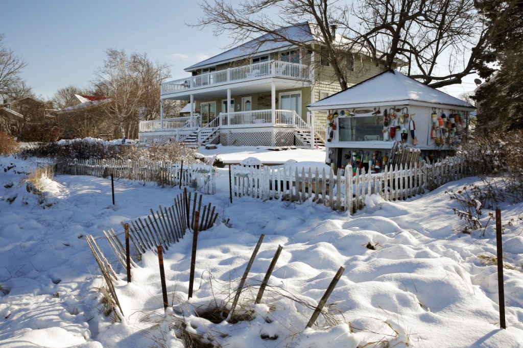 This two-family home on Willard Beach, overlooking Simonton Cove and Casco Bay, is one of a growing number of short-term rental properties in South Portland.