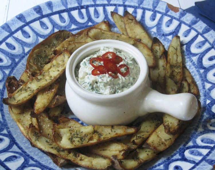 Brush the potato skins with olive oil, mixed with garlic and rosemary, instead of butter for a healthier snack.