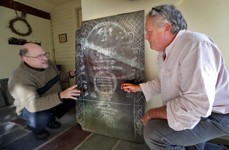 Walter Skold, left, and gravestone carver Michael Updike discuss the design of Skold's future tombstone, in Newbury, Mass., in December. Skold suffered a heart attack and died in Elkins Park, Pa., on Saturday, where he had recently moved from Freeport, Maine.