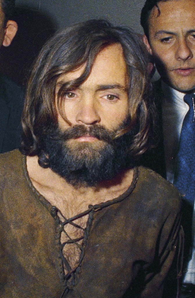 Charles Manson is led to his  arraignment in 1969.