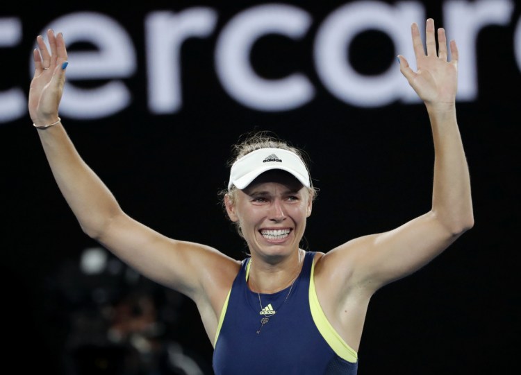 Caroline Wozniacki celebrates after defeating Simona Halep during the women's singles final at the Australian Open in Melbourne on Saturday.