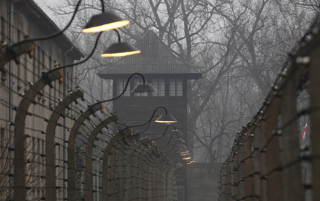 Barbed wire fences are pictured at Auschwitz.