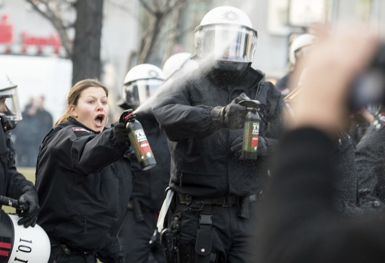 Police use tear gas as they clash with Kurdish demonstrators in Cologne, Germany, on Saturday.