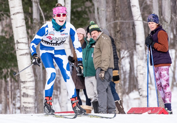 Natalie Teare of Yarmouth reacts while approaching the final downhill stretch during the Sassi Memorial on Saturday at Black Mountain in Rumford. Teare placed 30th overall with a time of 18:37.8.