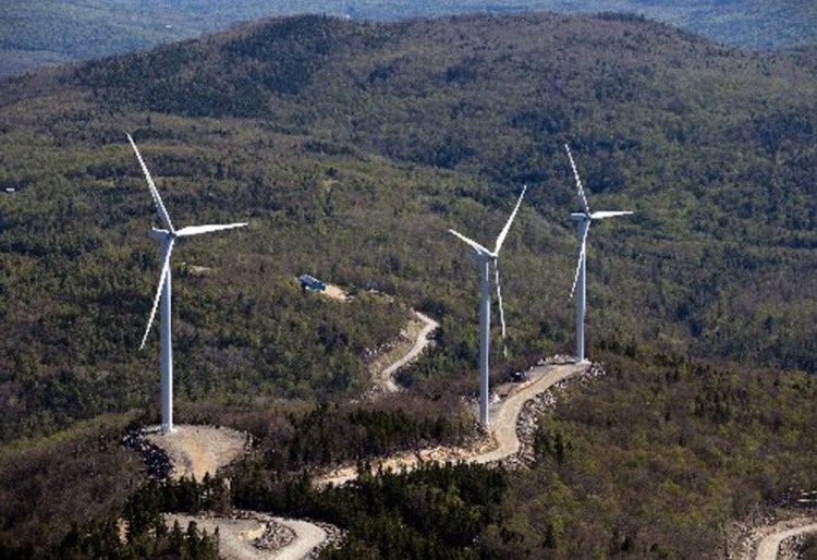 Turbines on a ridge south of Webb Lake in Weld. Renewable energy groups are girding for a legal challenge for Gov. Paul LePage's order halting new permits for wind power projects.