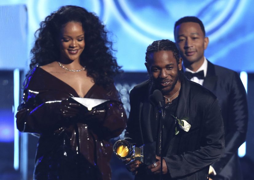 Rihanna, left, and Kendrick Lamar accept the award for best rap/sung performance for "Loyalty," from John Legend at the 60th annual Grammy Awards at Madison Square Garden on Sunday in New York.