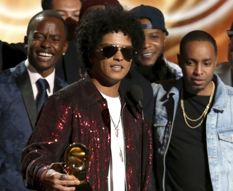 Bruno Mars accepts the award for album of the year for "24K Magic" at the 60th annual Grammy Awards at Madison Square Garden on Sunday in New York.