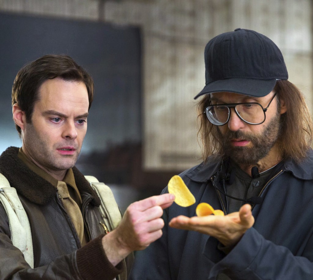 In the Super Bowl ad for Pringles, actor Bill Hader, left, introduces the made-up practice of "flavor-stacking" – combining different types of chips to make new flavors.