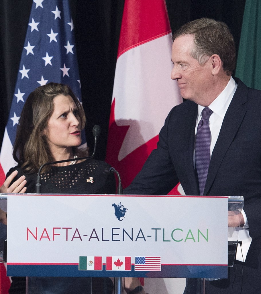 Canadian Foreign Minister Chrystia Freeland talks with U.S. Trade Representative Robert Lighthizer in Montreal on Monday.