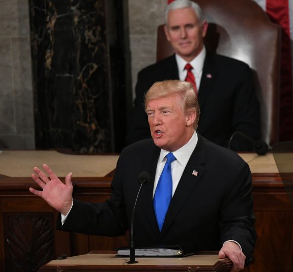 President Donald Trump delivers his first State of the Union address as Vice President Mike Pence and House Speaker Paul Ryan, R-Wis., listen on January 30, 2018.