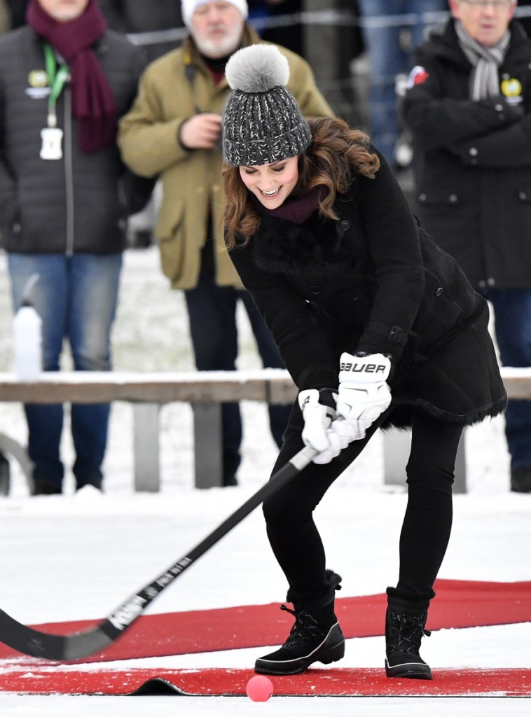 Britain's Prince William and Kate, Duchess of Cambridge, tried bandy, a popular Swedish sport similar to ice hockey, during their visit on Tuesday.