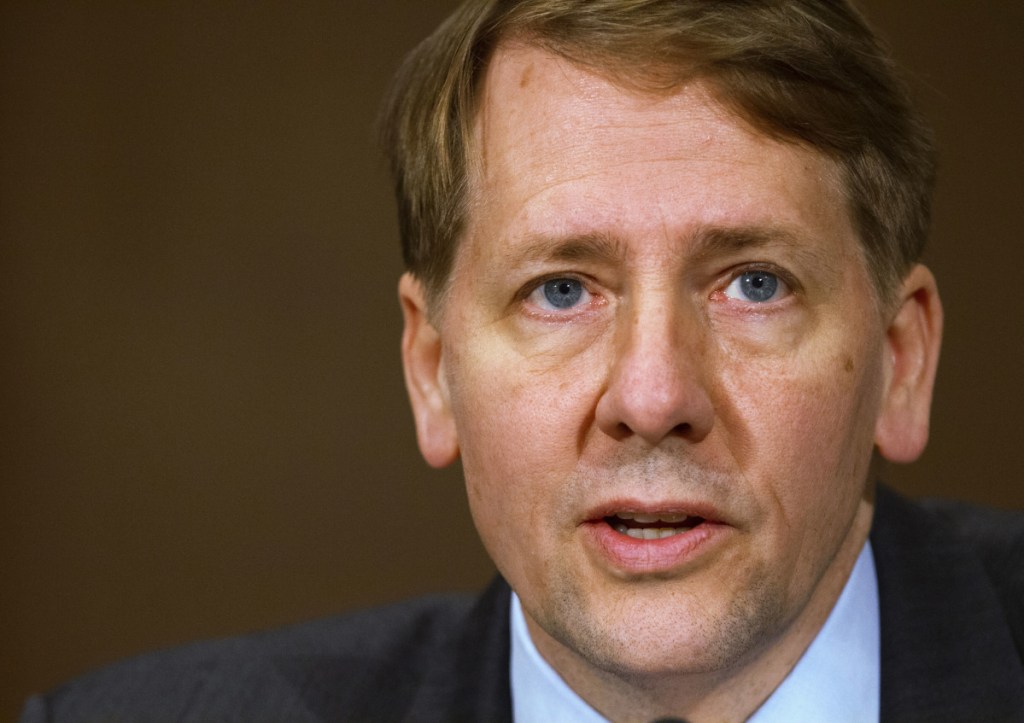 Richard Cordray, an Obama appointee, stepped down in November as director of the Consumer Financial Protection Bureau. A 2016 ruling would have made it easier for President Trump to fire him. That ruling was overturned Wednesday.