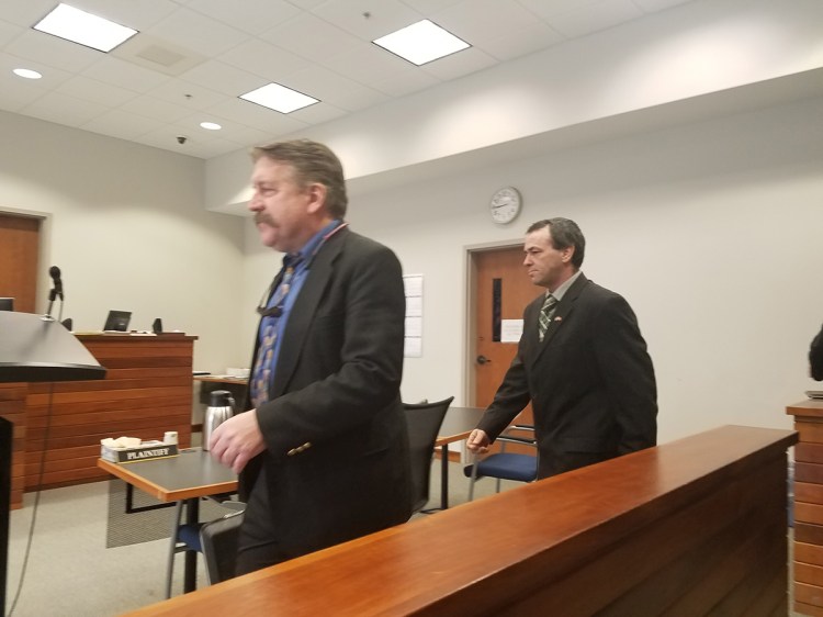 Former Lincoln County deputy Kenneth Hatch, right, enters the courtroom Friday with his attorney, Richard Elliot. 