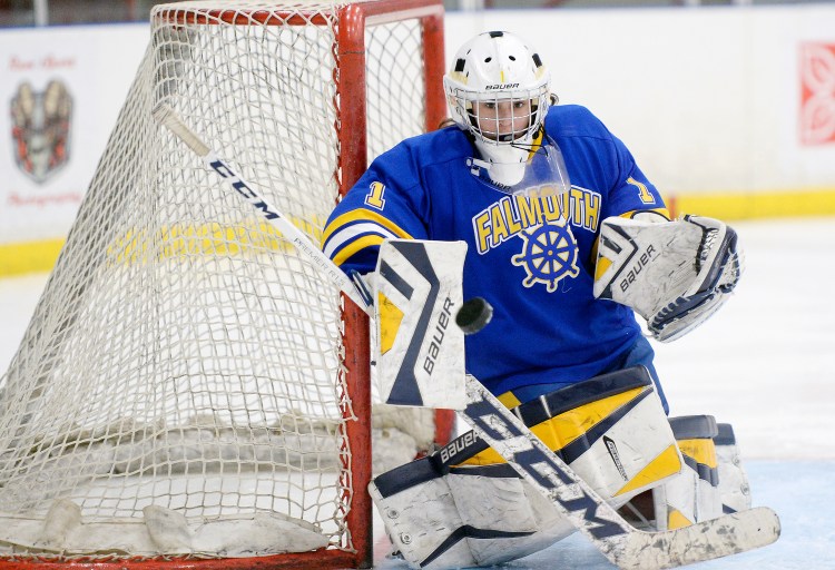 Falmouth goalie Julia Bonnvie makes a save in Friday's game. Bonnvie made 32 saves in a 3-3 tie.