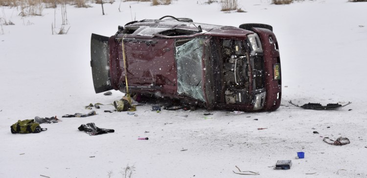 A burned, overturned Chevy Trailblazer lies on the ice on a small pond along Route 2 in Skowhegan early Monday. Desiree Strout died as a result of the accident, and the baby she was carrying was delivered by Caesarean section at Redington-Fairview Hospital in Skowhegan.