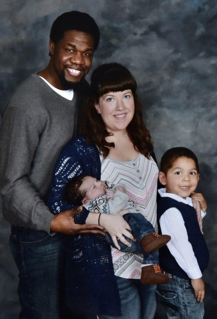 Lexius Saint Martin, his wife Mindy and their sons, Marcus, left, and Donovan in an undated photo. 