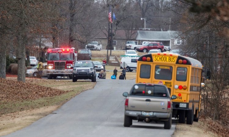Emergency crews respond to Marshall County High School after a fatal school shooting Tuesday in Benton, Ky. 