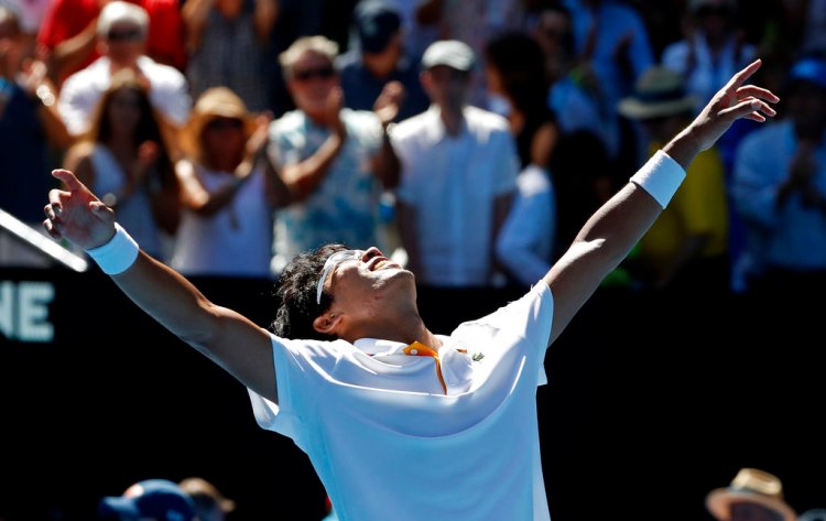 South Korea's Chung Hyeon celebrates after defeating American Tennys Sandgren in their quarterfinal at the Australian Open in Melbourne Wednesday.