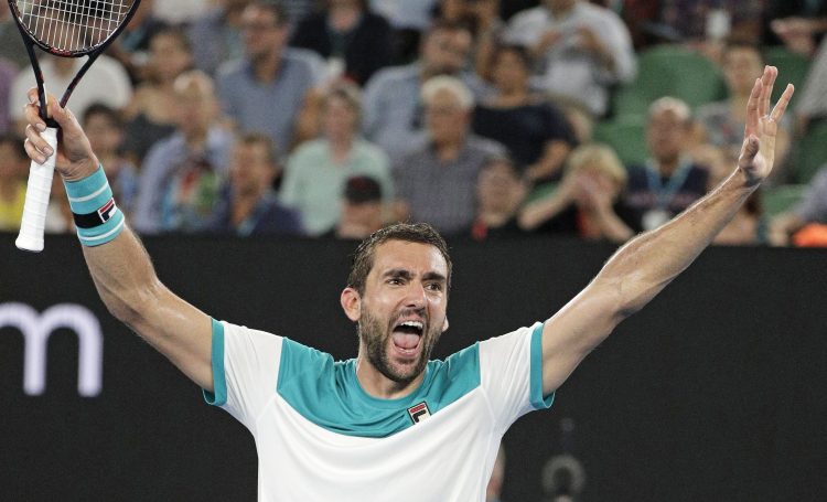 Croatia's Marin Cilic celebrates after defeating Britain's Kyle Edmund in their semifinal at the Australian Open  in Melbourne Thursday.