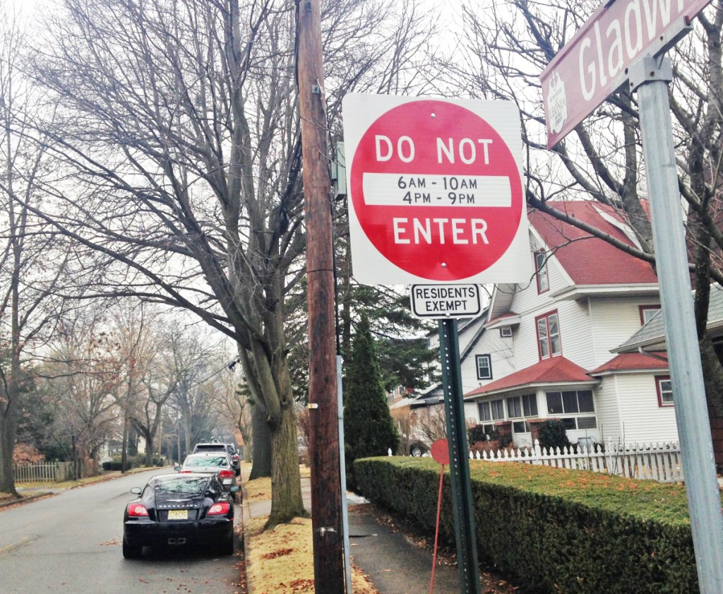A street sign warns nonresident drivers away from a Leonia, N.J., street frequented by thousands of vehicles heading for the George Washington Bridge.