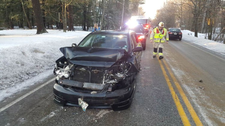 Icy roads contributed to a crash that involved a Toyota and a school bus in Falmouth on Wednesday.