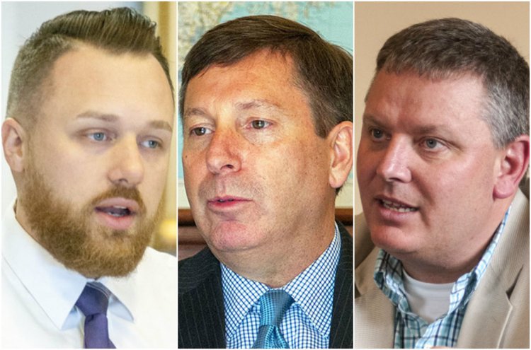 Senate Majority Leader Garrett Mason, left, House Republican leader Ken Fredette, center, and Senate President Mike Thibodeau, candidates for governor, said they would move ahead with a new law that allows pharmacies to sell naloxone over the counter. Republican Gov. Paul LePage has delayed implementation of the law.